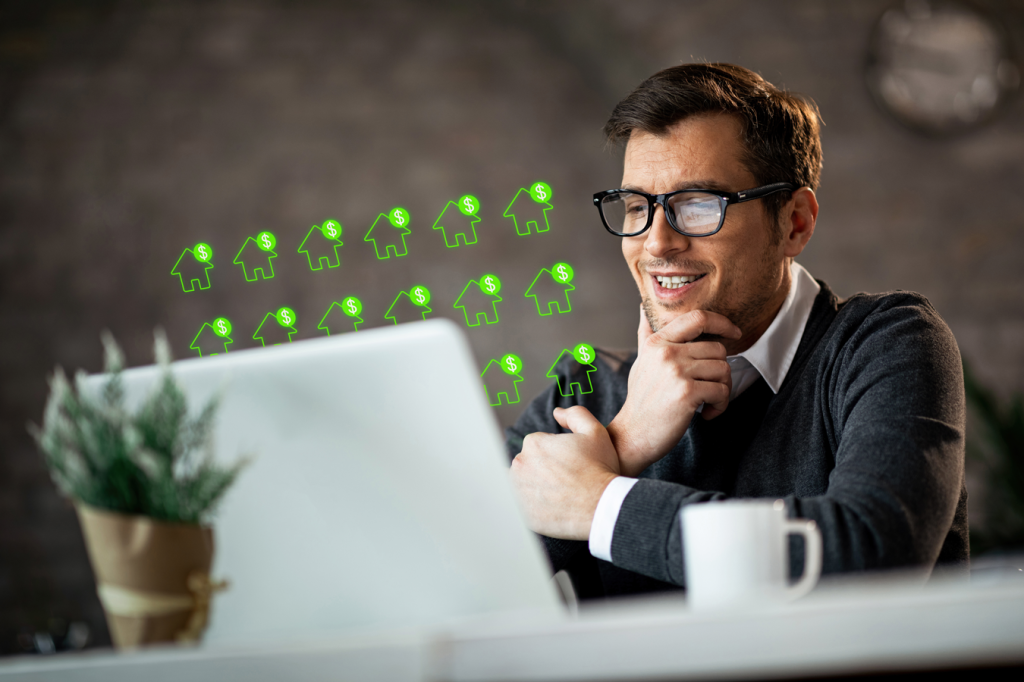 man seeing benefits of automated rent collection through looking at his laptop